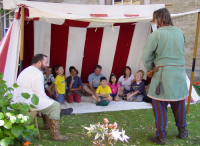 John narrating Beowulf at Peterborough